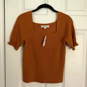 Beautiful pumpkin color cropped sweater.  Super soft Boat neck & puff sleeves